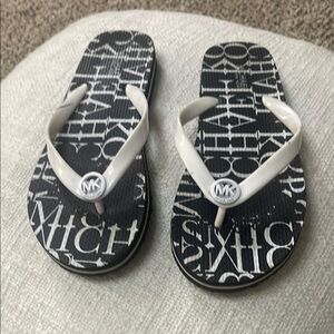 Michael Kors Monogram Black and White Flip Flops